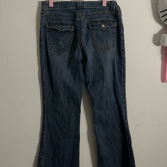 low rise boot jeans with red detailing on seams - Picture 2 of 5